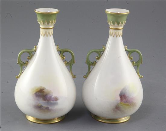 Harry Stinton for Royal Worcester. A pair of two handled bottle vases, c.1909, height 15cm